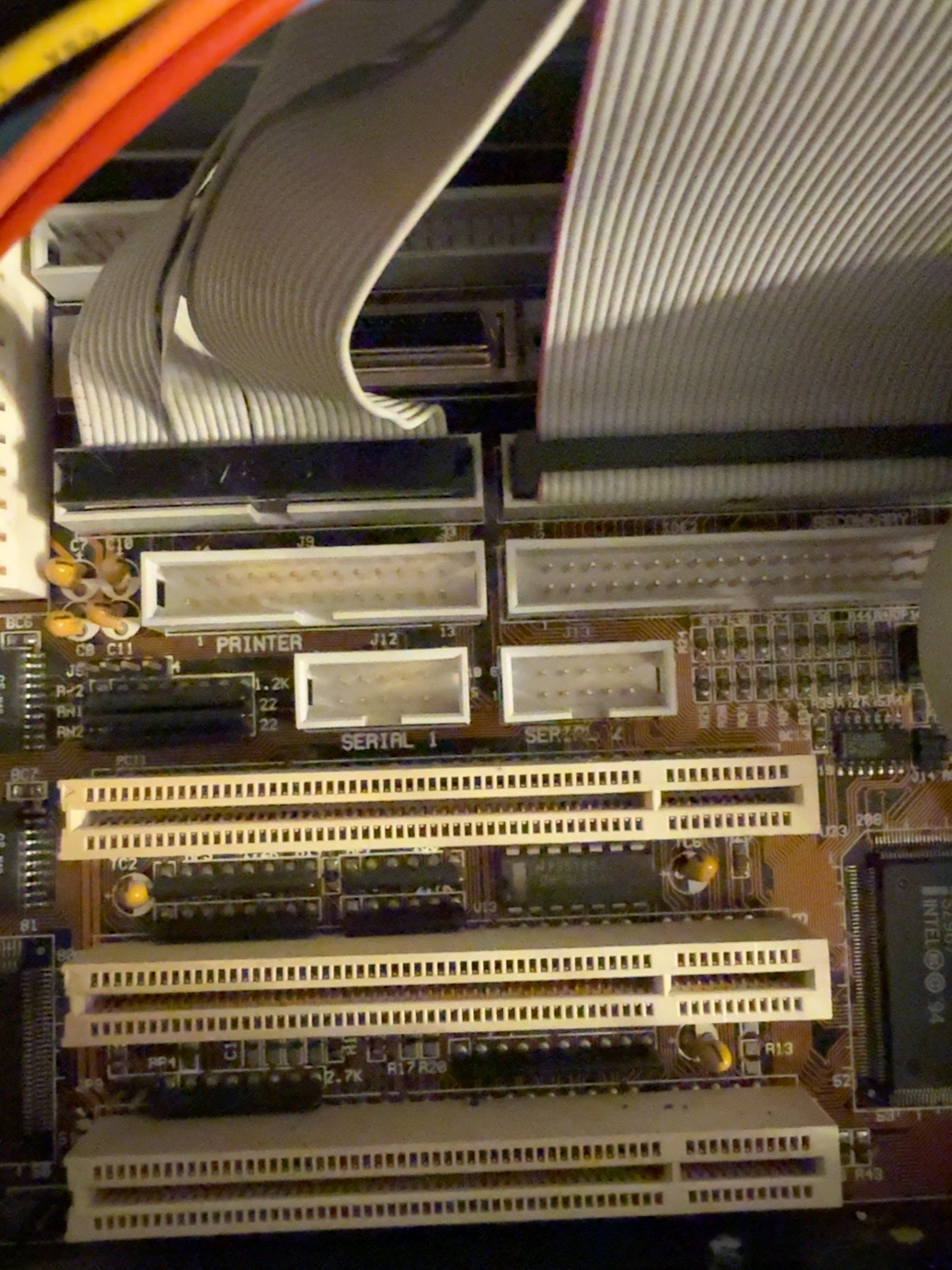 Close-up of the motherboard serial, printer, and IDE headers